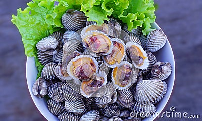 Boiled Scallops with Salad Seafood is high in iron, nourishing blood, low in calories, helping to lose weight and keeping healthy Stock Photo