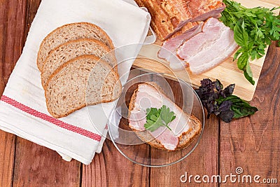 Boiled smoked pork, grain bread and open sandwich, top view Stock Photo