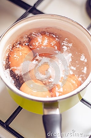 Boiling eggs Stock Photo