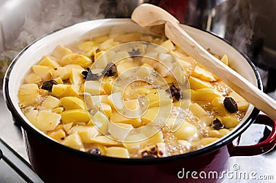 Boiling quince jelly Stock Photo