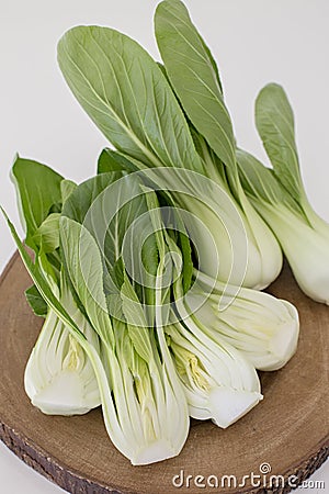 Bok choy chinese cabbage in a wooden board Stock Photo