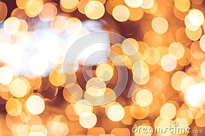 Bokeh background, place for holiday text. Blurred light in warm tone background. Store shop mall concept. Stock Photo