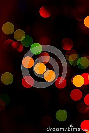 Bokeh of colored round festive Christmas lights Stock Photo