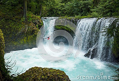 A bold Kayaker goes over the gushing Spirit Falls Stock Photo