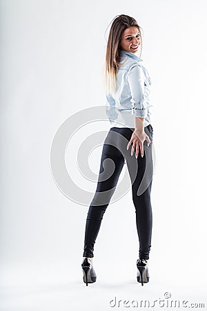 Woman's hand on firm buttock, pride on her face Stock Photo