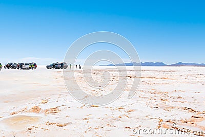 Bolivia Colchani tourists on tour in the Salar of Uyuni Editorial Stock Photo