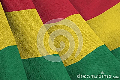 Bolivia flag with big folds waving close up under the studio light indoors. The official symbols and colors in banner Stock Photo