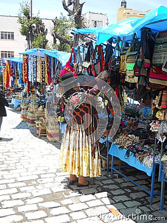 A bolivian woman organising her market Editorial Stock Photo