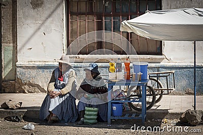 Bolivian women along the road to Oruro - Bolivia Editorial Stock Photo