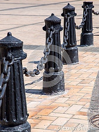 The bollard cast-iron black. Stock Photo