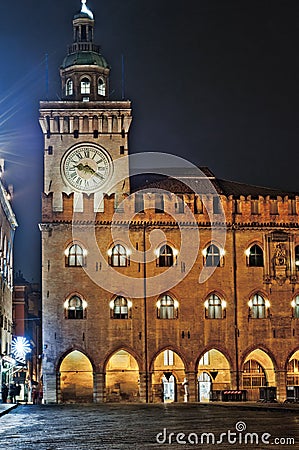 Bologna, Italy. The clock tower Piazza Maggiore at night Editorial Stock Photo