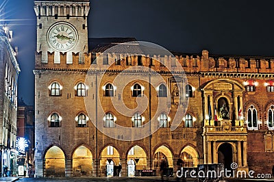 Bologna, Italy. The clock tower Piazza Maggiore at night Editorial Stock Photo