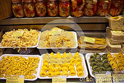 Showcase with different Italian Christmas gourmet food. Shop window of delicacies from Editorial Stock Photo