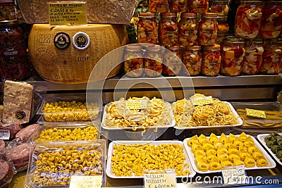 Showcase with different Italian Christmas gourmet food. Shop window of delicacies from Editorial Stock Photo