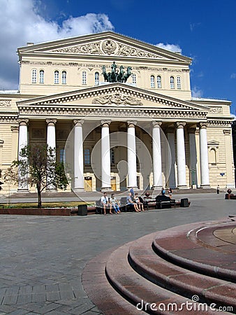 Bolshoi theater in Moscow. People rest on the benches on the square. Editorial Stock Photo