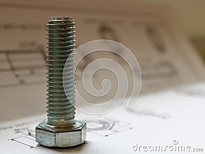 Bolt close-up on technical documentation Stock Photo