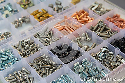 Bolts, screws, nuts, rivets on a counter of shop Stock Photo