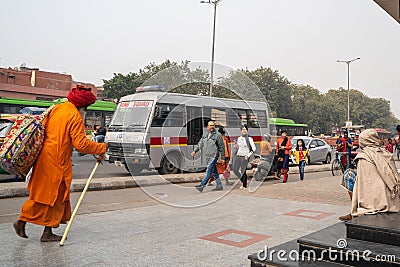 Bomb squad police vehicle parked outside of a Delhi Metro Station as people walk by Editorial Stock Photo