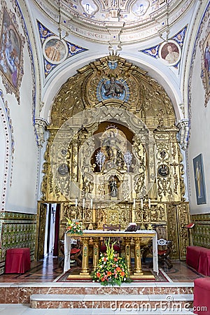 Bonares, Huelva, Spain - August 14, 2020: Main altar of the Church of Our Lady of the Assumption in the town of Bonares, Huelva, Editorial Stock Photo