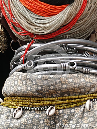 Bonda tribal woman with large necklaces and earrings handmade crafts at weekly market, India Editorial Stock Photo