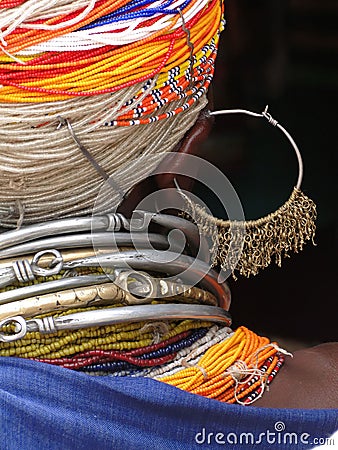 Bonda tribal woman with large necklaces and earrings handmade crafts at weekly market, India Editorial Stock Photo