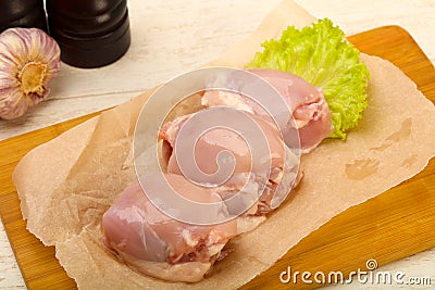 Boneless raw chicken thighs Stock Photo