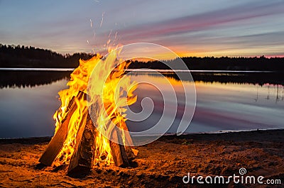 Bonfire on the beach sand Stock Photo