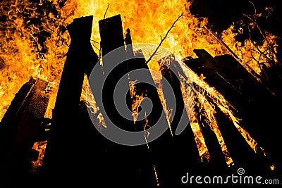 Bonfire burning wood in flames at night Stock Photo