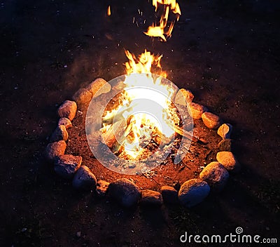 Bonfire in the night, outdoor camping in summer with guitar Stock Photo