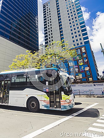 Bonifacio Global City, Taguig, Metro Manila - The BGC Bus, public transport servicing the main routes in the CBD. Editorial Stock Photo