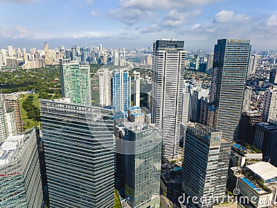 Bonifacio Global City, Taguig, Metro Manila - Fort Bonifacio skyline, with Makati cityscape at the upper left of photo Editorial Stock Photo