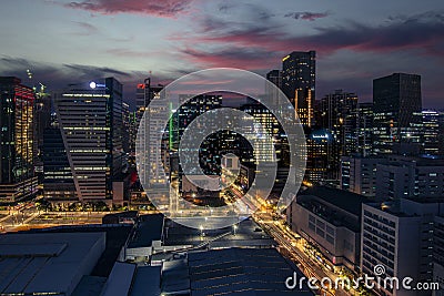 Bonifacio Global City, Taguig, Metro Manila, Philippines - The evening BGC skyline agaisnt the setting sun Editorial Stock Photo