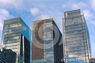 Bonifacio Global City, Taguig, Metro Manila - Three modern office towers with full glass curtain wall facades. Editorial Stock Photo
