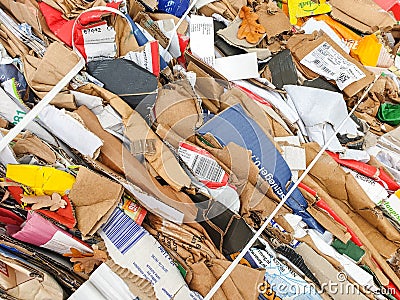 BONN, GERMANY - November 2019: Packaging of waste paper, raw materials for recycling Editorial Stock Photo