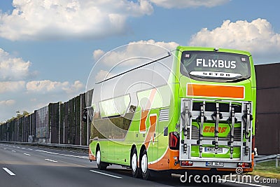 Bonn, Germany - 13 September 2020. Flixbus tourist coach driving on a highway in Germany, empty road. Editorial Stock Photo