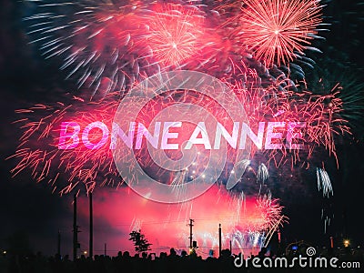 Bonne annee card on a fireworks background Stock Photo