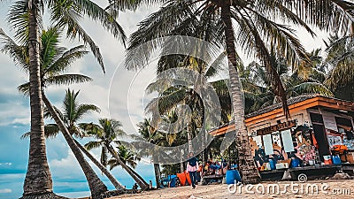 Bontang, Indonesia - Des 28, 2020 : a bunch of people on holiday during the day on a Beras Basah Island Editorial Stock Photo