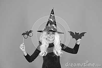 Boo to you. Little wicked witch orange background. Small child wear witch costume for holiday celebration. Halloween Stock Photo