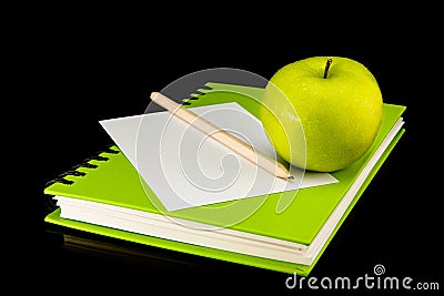 Book,apple,paper and pencil Stock Photo