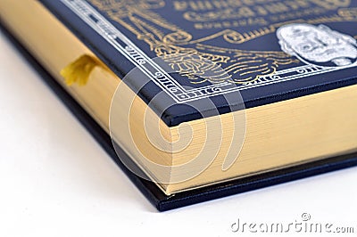 A book with a black cover and edge gilding Stock Photo