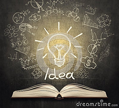 Book with business sketches and painted bulb as a concept Stock Photo