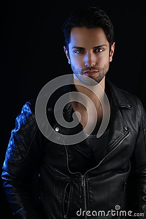 Book cover for a vampire novel - Handsome man wearing a leather jacket Stock Photo