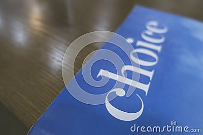 A book cover written `choice` on the wooden table Stock Photo