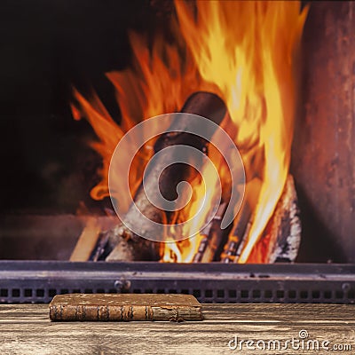 Book fireplace relax winter fall autumn rustic dark wooden floor Stock Photo