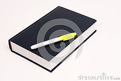 Book with marking pen Stock Photo