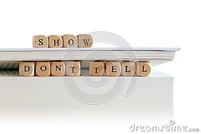 Book with message show, don't tell Stock Photo