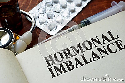 Book with words hormonal imbalance Stock Photo