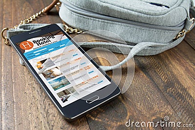 Booking hotel online,by smartphone . Travel and tourism concept. Stock Photo