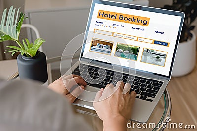 booking online concept, person using laptop computer planning travel search hotel booking Stock Photo