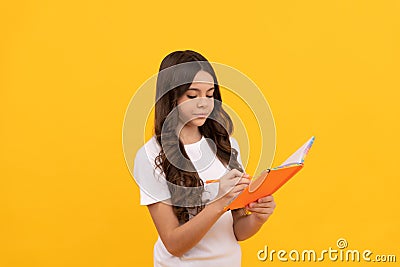 bookish kid making notes. student ready for studying. taking notes. overwhelmed intellectual child Stock Photo